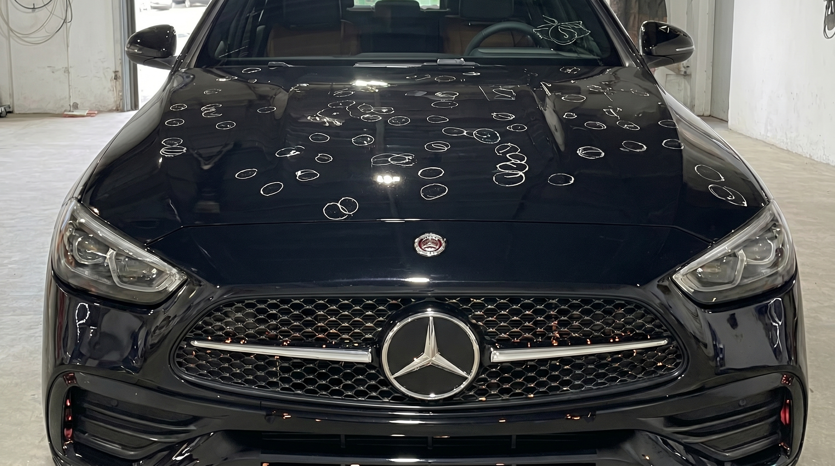 Hail damage hood — paintless dent repair before and after — before